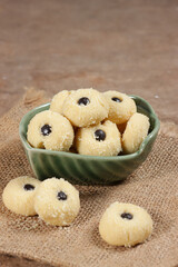 Homemade thumb print cookies filled with choco chips.
