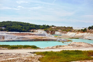 Quarry extraction porcelain clay, kaolin, with turquoise water