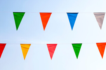 Triangular flag in a colorful celebration.