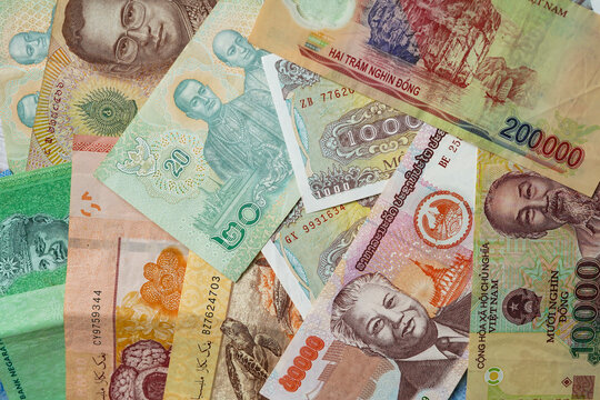 Asian banknotes from different countries - thai baht, vietnamese dong, malaysian ringgit, lao kip