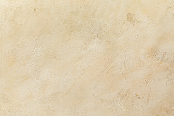 Sand color beige seamless stone texture. Plaster background