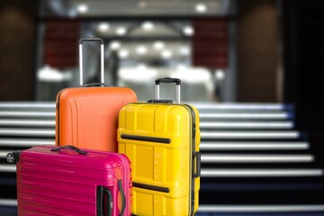 Travel Fashion. Plastic Suitcases Standing At Empty Airport Corridor, Stylish Luggage Bags Waiting At Terminal Hall,