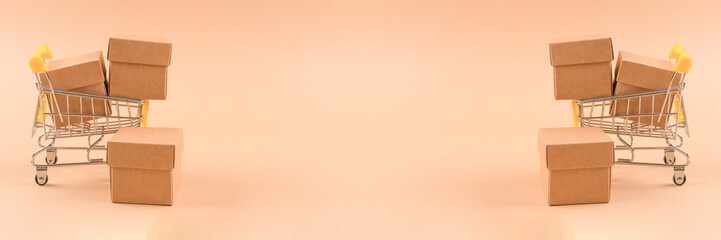 Banner with paper boxes for storaging or transportation over light brown background with copy space. Sustainable packaging concept. Delivery service