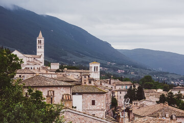 Fototapeta na wymiar Assisi in Italy. Cloudy landscape