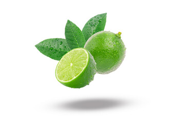 Flying green lime with slice and leaf has water drop isolated on white background.