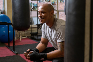 Mature man sitting in gym