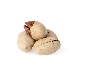 Pecan nuts in shell isolated on white background. Copy space.