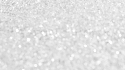 White and grey bokeh glitter background.  New Year, Christmas and all celebrations backgrounds concepts. 