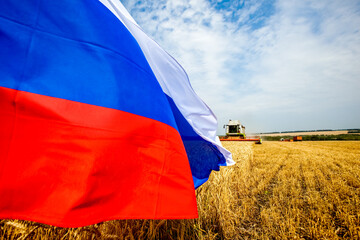 Wheat and rye field with Russian flag. Russian agriculture for export