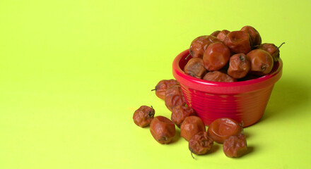 Indian jujube or ber or berry grown in the wild or jungle. Closeup of India fruit on beautiful background.