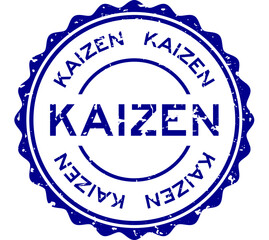 Grunge blue kaizen word round rubber seal stamp on white background