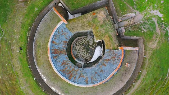 Aerial Top Panning Shot Of Birds Flying In Fort De Ronce, Drone Flying Upwards Over Green Hill - Val-Cenis, France