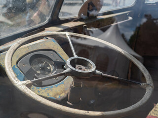 Fototapeta premium Dashboard and steering wheel of old-timer car