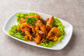 udang saus telur asin or Salted egg fried shrimp with curry leaves