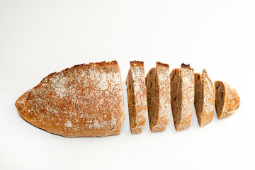 Sliced bread isolated on a white background. Bread slices viewed from above. Top view. Food abstractions