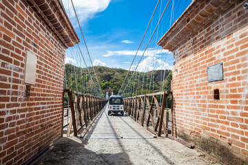 The historical Bridge of the West a a suspension bridge declared Colombian National Monument built in 1887 over the Cauca River