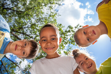 Happy faces of children bottom view