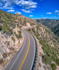 Tucson, Arizona- High angle view of a highway in between the slope of the rocky mountain