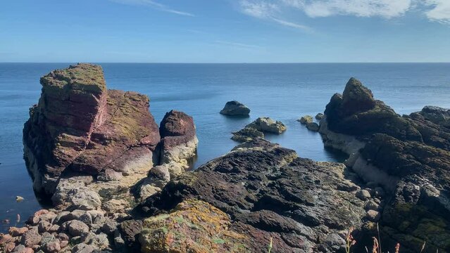 Scottish seashore with cliffs. St Abb's Head National Nature Reserve on the Berwickshire coastline, Scotland, UK