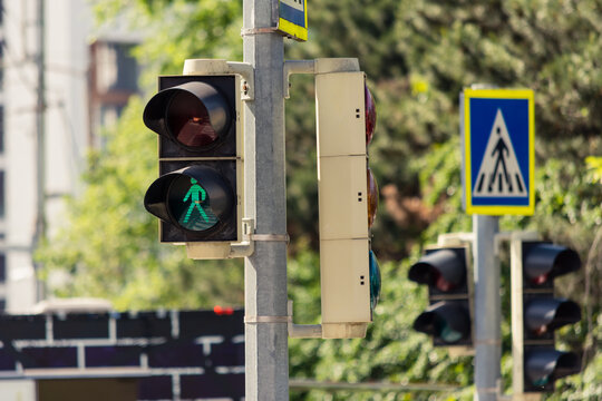 Pedestrian Semaphore On Green Light With A Walking Man As Icon