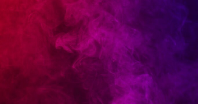 Video of white smoke with red light on black background