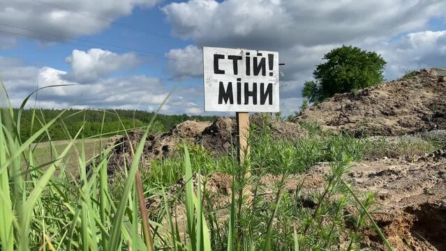 Danger, mines. War in Ukraine. Minefield. Sign caution