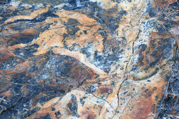 Detail of slate and quartz at Tregardock Beach Cornwall