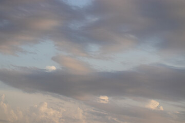 blue sky with gray white puffy clouds. High quality photo