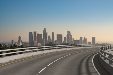 Plakat Empty urban asphalt road exterior with city buildings background. New modern highway concrete construction. Concept of way to success. Transportation logistic industry fast delivery. Los Angeles. USA.