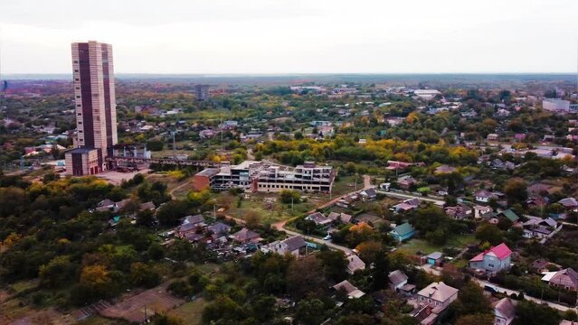 aerial view on the city in Ukraine, abandoned factory, underground mine tower