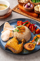 Steamed Rice with Fried Chicken or Hainanese Chicken Rice.
