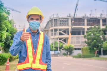 Asian Engineer standing outdoor on site construction posting confident , Engineer construction happy job success with in target planning