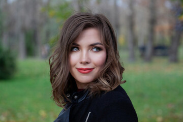 Fototapeta premium Young woman with long bob hairstyle outside