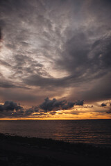 Sunset on the sea yellow and clouds