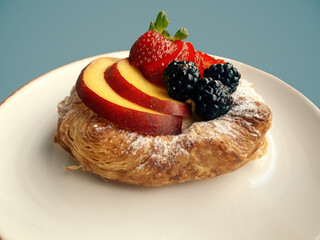 Croissant with fresh forest fruits
