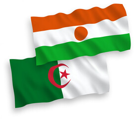 Flags of Republic of the Niger and Algeria on a white background