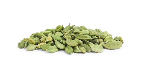Pile of dry green cardamom pods isolated on white