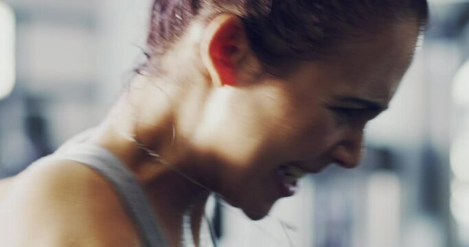 Fit, active and intense boxing workout of a woman at the gym. Closeup of female boxer in hardcore power training preparing for a fight through pain, sweat and exercise for a healthy strong lifestyle.