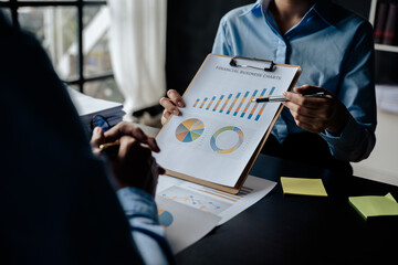 Close up of hands are working and brainstorming on paperworks about business financial and marketing.