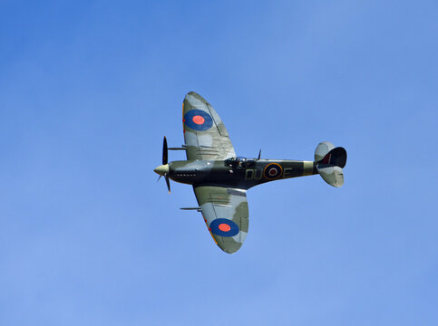 Vintage Supermarine Spitfire MK Vc AR501 G-AWII aircraft in flight.