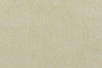 Beige plastered wall texture. Seamless surface and abstract solid background. Pale painted wall built structure.
