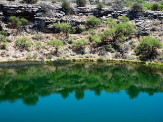Fototapeta na wymiar Beautiful green water of Montezuma Well, part of Montezuma Castle National Monument - AZ, USA