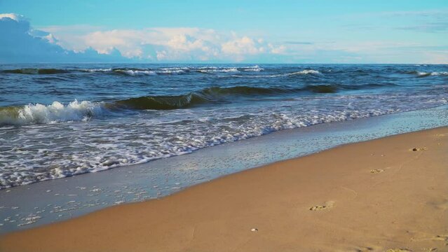 Sunset over ocean waves wash sand beach. Tropic nobody seascape. Concept preserving purity of nature and ecosystem