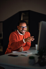 Smiling male talking with one client, having an online meeting.