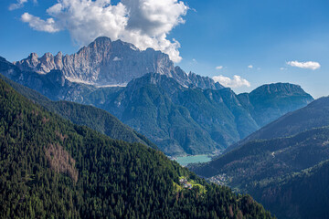 Fototapeta premium Top view of Civetta Mount and Alleghe lake in the dolomitic scenery, Belluno province, Italy