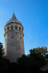 view of Galata Tower in Istanbul, Turkey with blue sky on the background