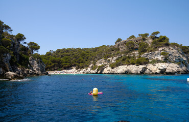 Menorca, Spain: Beautiful bay with sailing boat catamaran