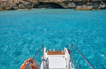 Menorca, Spain: Beautiful bay with sailing boat catamaran