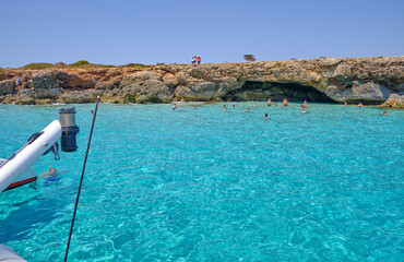 Menorca, Spain: Beautiful bay with sailing boat catamaran