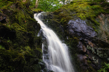 Fototapeta na wymiar Beautiful waterfall in Laholm, Sweden. Long exposure ￼photo.